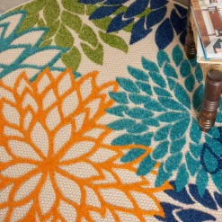 Outdoor Rugs-Kirkland's Home Tangerine Floral Burst Round Outdoor Area Rug Orange/Blue/Green